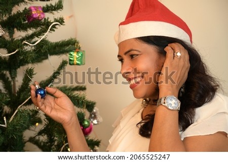 People are celebrating Christmas together with happiness on their face