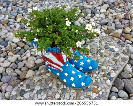 flower plant in flag boot planter