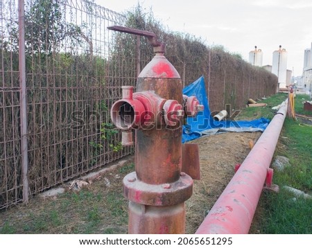 Red fire hydrant for fire anticipations at the factory