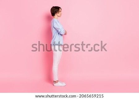 Full size profile side photo of charming lovely serious businesswoman look copyspace isolated on pink color background