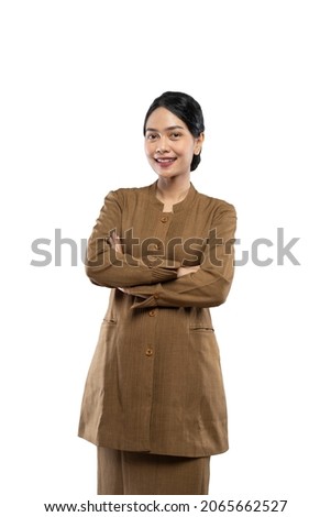 Beautiful civil servant woman smiling wearing uniform while standing Royalty-Free Stock Photo #2065662527