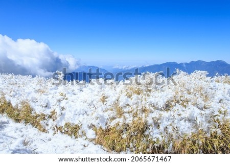 Snow covered mountains with blue sky in Hehuan Mountain of Taiwan, Asia. Taroko National Park is one of Taiwan's most popular tourist attractions