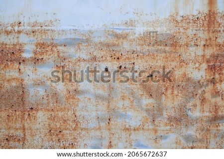 Old Metal Surface with Peeling Paint. Grunge Background 