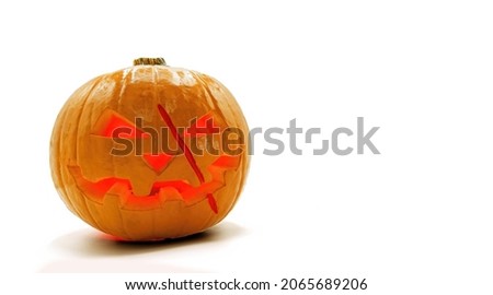 Halloween concept, a pumpkin with red scar eyes on a white background copy space