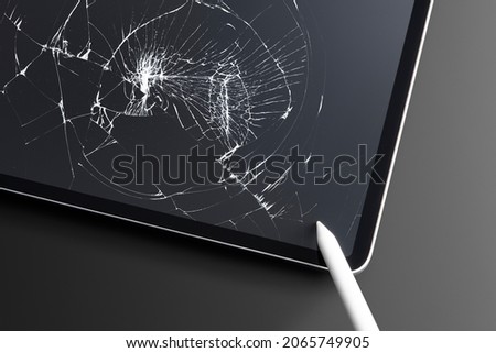 Broken tablet with cracked screen broken glass