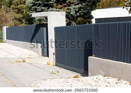 Close up picture of modern property fence - entrance, family house in Budapest, Hungary