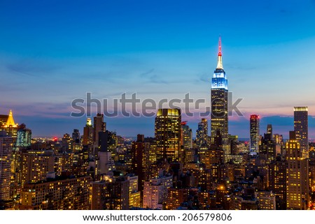 Beautiful New York City skyline with urban skyscrapers at sunset.