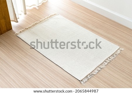 White woven carpet background on the floor