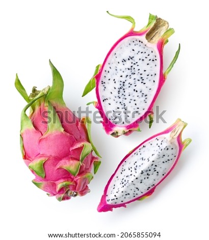 Fresh whole, half and sliced dragon fruit or pitahaya (pitaya) isolated on white background, top view
