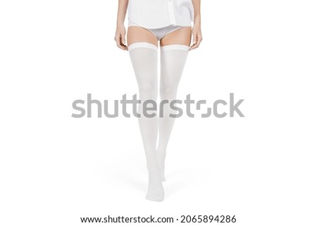 Anti-embolic Compression Hosiery for surgery isolated on white. Medical stockings, tights for varicose veins and venouse therapy. Thrombo-embolic deterrent (TED) hose or anti-embolism stockings Royalty-Free Stock Photo #2065894286