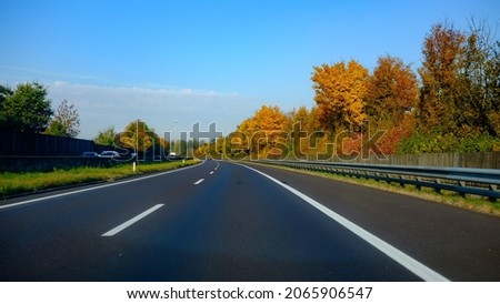 bavaria, germany, 26 oct 2021, driving on a motorway on a sunny day in autumn Royalty-Free Stock Photo #2065906547