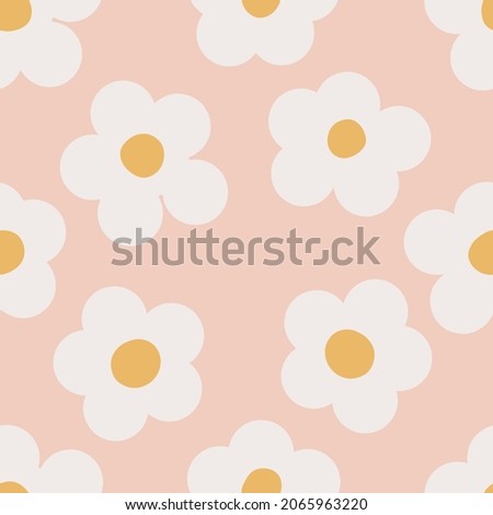 Naive seamless floral boho pattern with white daisies on a peach background in doodle style. Сute contemporary minimalistic trendy boho background design for kids. Scandinavian nursery print  Royalty-Free Stock Photo #2065963220