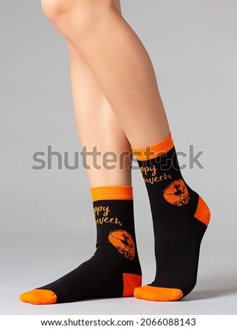 halloween socks on a gray background