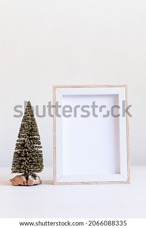 Christmas background empty wooden picture frame mock up and decoration. Winter holidays celebration concept with copy space for text. Mockup