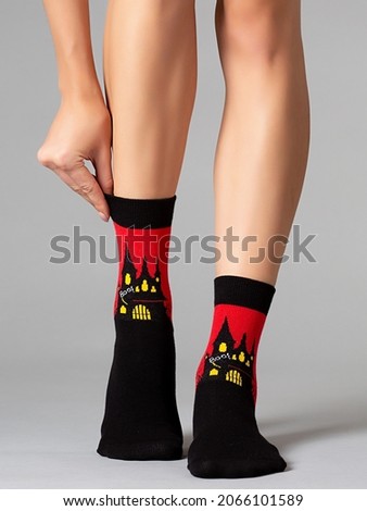 halloween socks on a gray background
