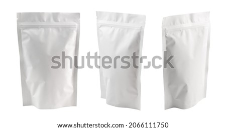 Stand-up pouches at different angles isolated on a white background. White doypacks. Royalty-Free Stock Photo #2066111750