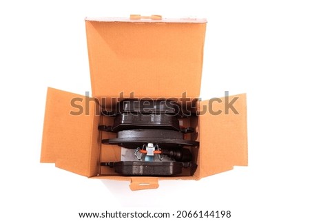brake pads in box isolated on white background 