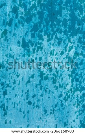 background blue rough concrete wall with splashing water