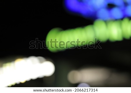 Blurry Colorful lamps that glow in the dark. Bokeh lamps. Party lights, defocused