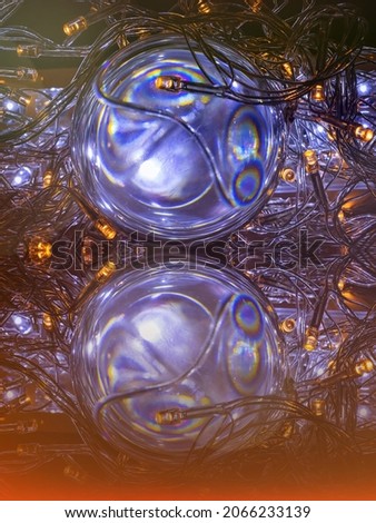 Glass balls with LED lights for festive decorations.