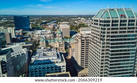 Aerial of downtown Indianapolis buildings, courthouse, and skyscrapers