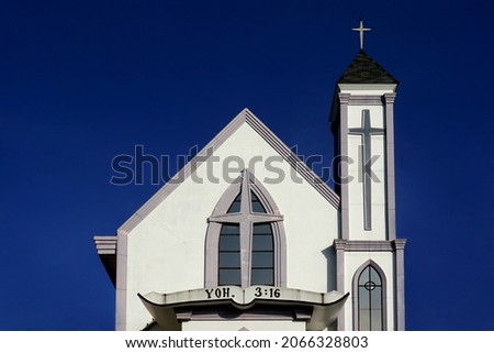The Indonesian Gospel Camp Cathedral or in indonesia called (Gereja Kemah Injil Indonesia) with blue sky