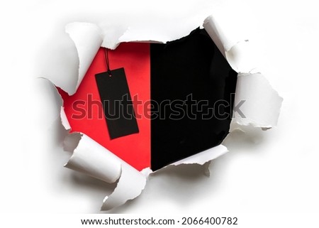 Torn white paper on a red and black background. Copy space for text, mock up, banner