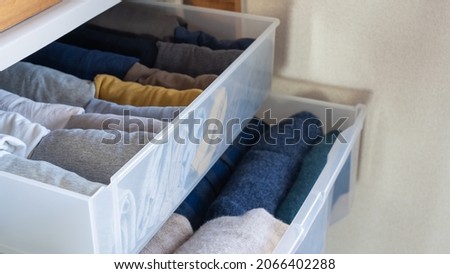 Organize winter and summer clothes.Seasonal change of clothing.