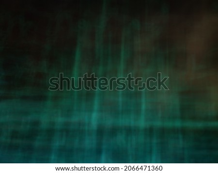 Blurry green and black background