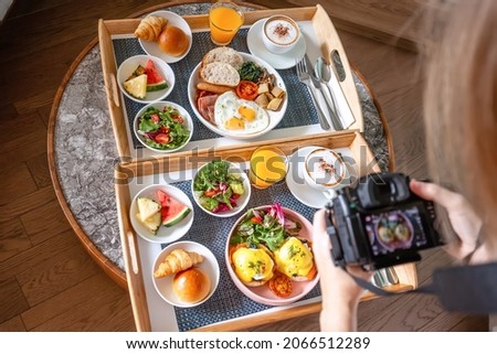 Young Female Photographer Make Photoshoot of Fresh Breakfast in Hotel. Behind the Scenes. Backstage of Woman with Digital Camera Working and Shooting Food. 4k