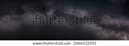 Real Night Sky Stars With Milky Way Galaxy. Natural Starry Sky Background. Panorama Panoramic View.