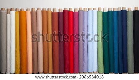 Linen fabric rolls in a row for banner or poster Royalty-Free Stock Photo #2066534018