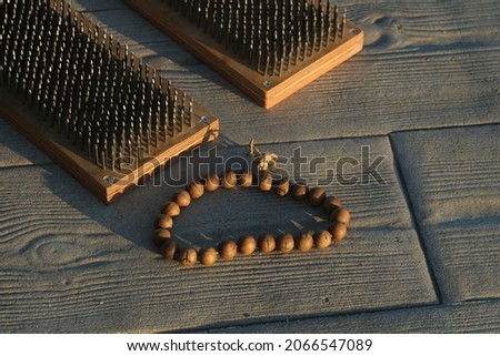 sadhu board and wooden beads  