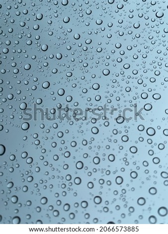 Rain drops on glass, rainy day, water droplets, blue, wet, bubbles, car window, background
