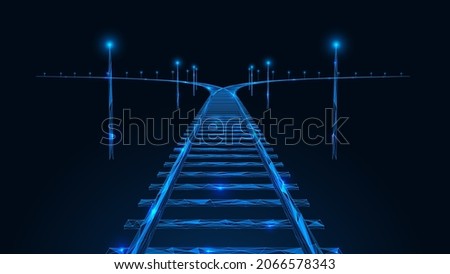 Railway interchange. Empty rail track. A low-poly construction of interconnected lines and dots. Blue background. Royalty-Free Stock Photo #2066578343