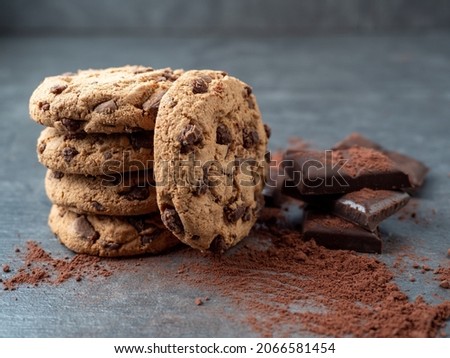 Chocolate chip cookies on a gray background.
