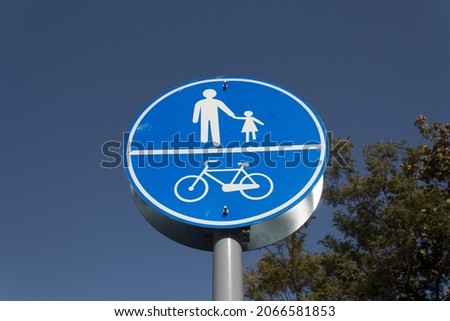 pedestrian and bicycle shared road sign