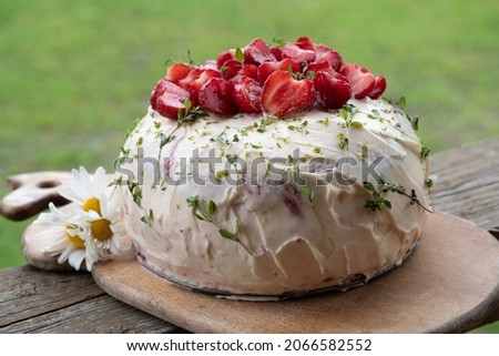 poppy seed cake with strawberries and sour cream