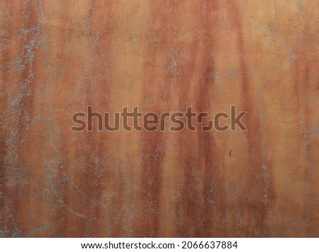 Vintage stucco wall texture with yellow orange red tones and grey striations