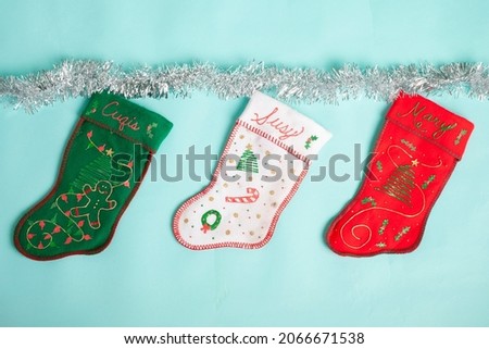 christmas stocking decoration on blue background