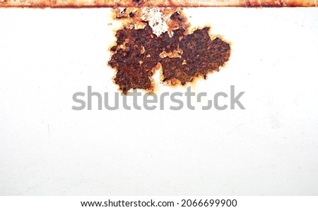 Rust of metals.Corrosive Rust on old iron white.Use as illustration for presentation.corrosion.                         Royalty-Free Stock Photo #2066699900