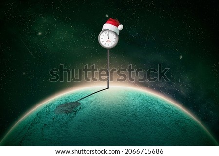 Street clock, with hands at 12, in a Santa hat, on a planet in space. Abstract New Year card. Festive background.