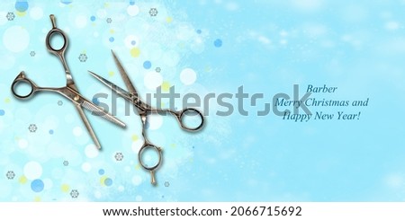 Barber scissors on a blue background. Snowflakes. Multi-colored glare. Happy New Year hairdresser. Congratulatory banner for Hairdressers, Beauty Salons, Barbershop. Christmas background.
