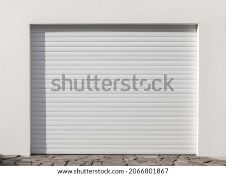 Automatic Roller shutter gates white color close-up Royalty-Free Stock Photo #2066801867