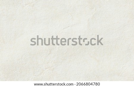 Seamless and tileable paper texture background. Close up of vintage off white, rough parchment paper texture 