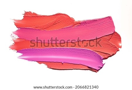 Lipstick abstract strokes smudges  background texture multi colored red pink fuchsia isolated on white background