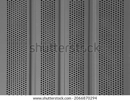 Texture background: gray metal iron grating, grid or steel grate. Grey venting, ventilation with geometric circles pattern 
