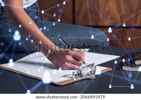 A potential employee signing the contract to boost her career and gain new opportunities in personal growth. Hiring a new talented crew. Social media hologram icons. Women in business concept.