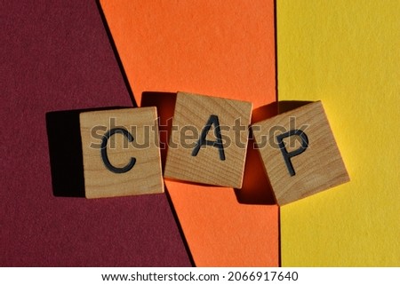 Cap, word in wooden alphabet letters used by Generation Z to mean something that is false or an outright lie Royalty-Free Stock Photo #2066917640