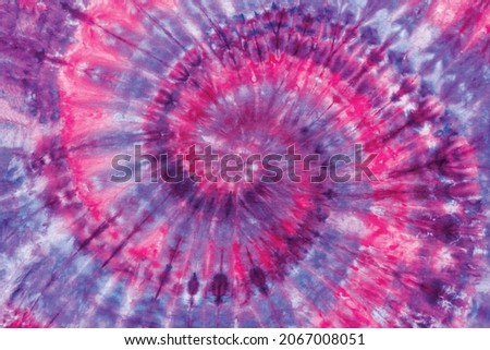 Colorful Fashionable Retro Abstract Psychedelic Tie Dye Swirl Design.  Royalty-Free Stock Photo #2067008051